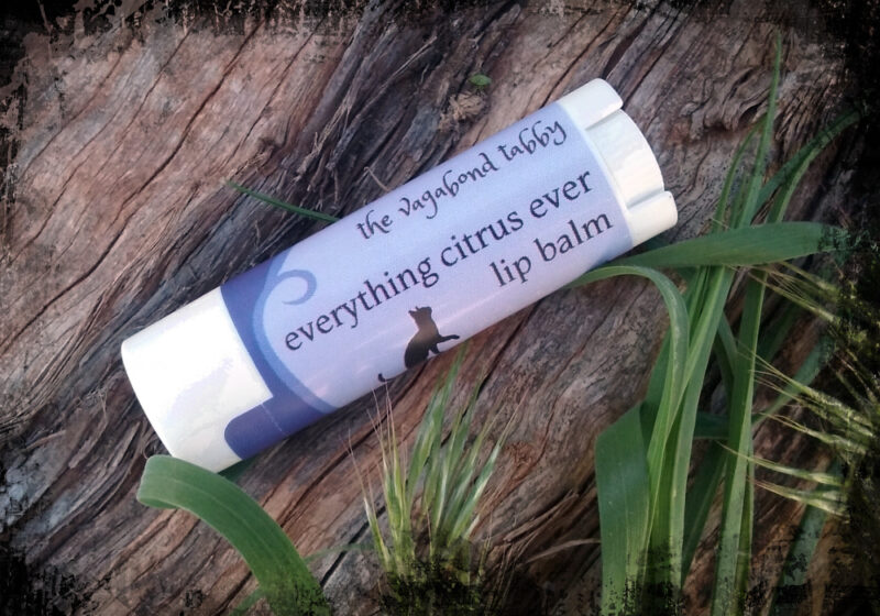 A single white tube of lip balm.