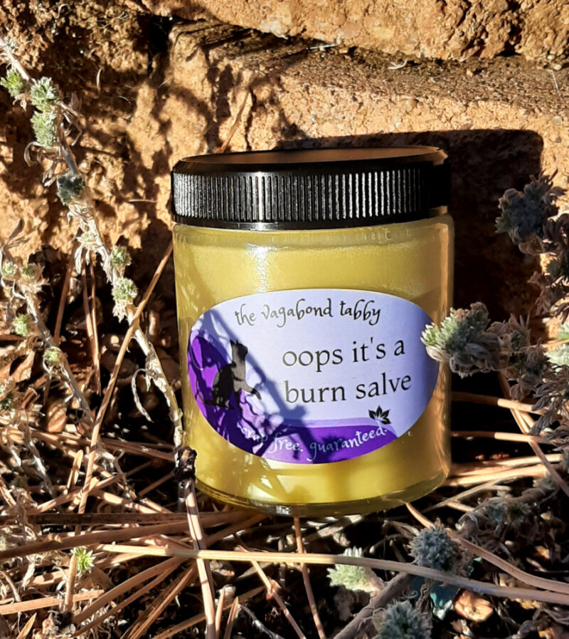 A jar of pale yellow salve.