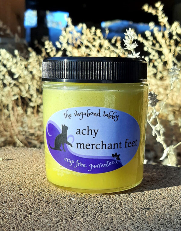 A jar of pale yellow salve.