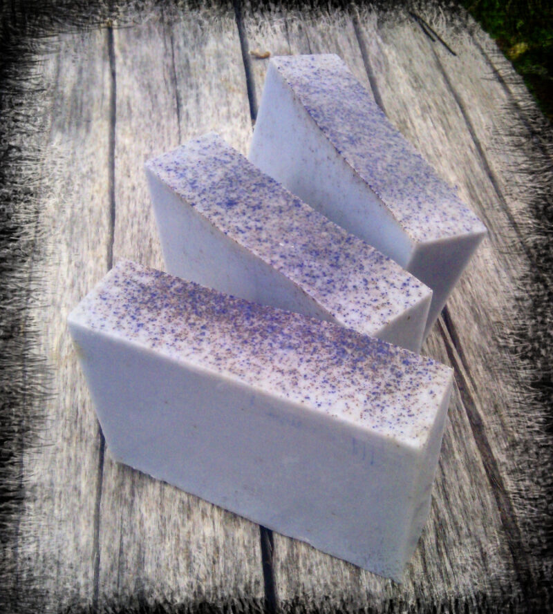 Three bars of blue-grey soap.