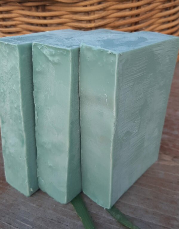 Three bars of softly green soap.